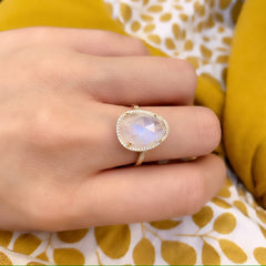 organic shape rainbow moonstone ring in yellow gold with diamonds