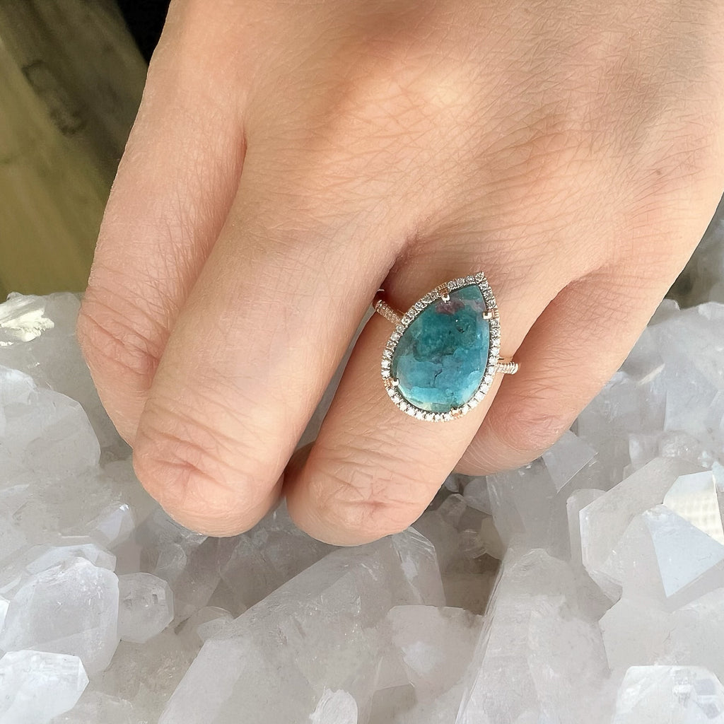 14k gold and diamond ring with an extra special paraiba tourmaline center