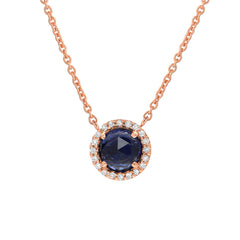 5.0mm domed rose cut stone in a 14k gold and diamond halo