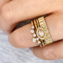 Scatter diamond eternity band worn with other liven pieces