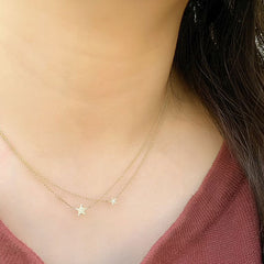 Pretty star necklaces layered together