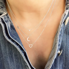 mini open heart necklace layered with other liven pieces