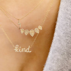 five pear shape necklace with pave diamonds layered with other liven necklaces