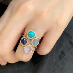 a selection of rosie rings in varous colored stones