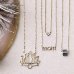 ethos necklace shown with other liven pieces