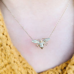 larger bee necklace on neck