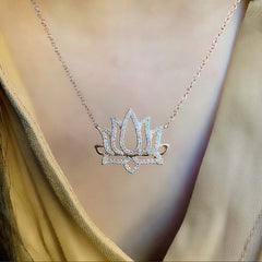 lotus flower necklace in 14k gold with diamonds