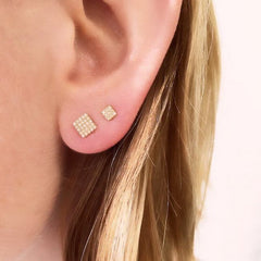 square post earring on ear
