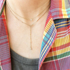 Wear reversed for a lariat look