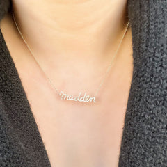 pretty script necklace of the name madden in madden's handwriting