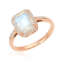 flat faced rainbow moonstone oblong in a sold 14k gold and diamond setting