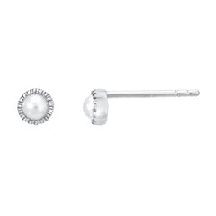 simple petite pearls set in 14k gold bezels