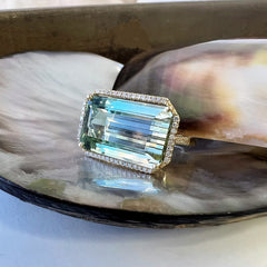 large green tourmaline ring in 14k yellow gold