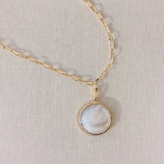 layer this charm on our hand made chain with other charms from our collection