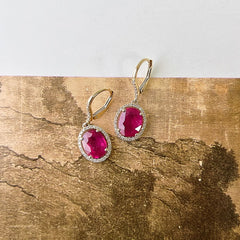 ruby earrings in 14k yellow gold with diamonds