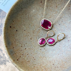 ruby earrings and necklace in 14k yellow gold with diamonds