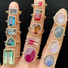 a gorgeous array of dazzling colored stone rings