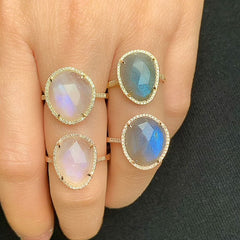 natural shaped labradorite and rainbow moonstone rings on hand