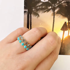 rosie rings in bright summery turquoises and diamonds