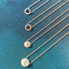 a selection of 5 and 7mm diameter rosie necklaces'