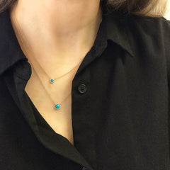 3mm mini turquoise in a 14k gold and diamond halo with the 5mm version