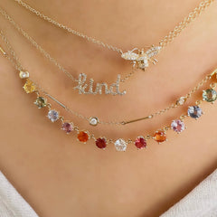 bee necklace, kind script necklace, unity chain station diamond necklace and one of a kind multicolored sapphire necklace