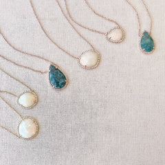 14k gold and diamond necklaces in multicolor paraiba tourmaline and irridescent opals