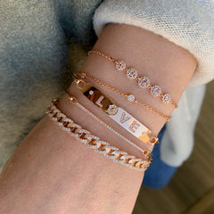 romantic stacked bracelets in rose gold