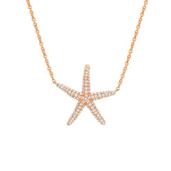 starfish shape necklace in 14k gold with diamonds
