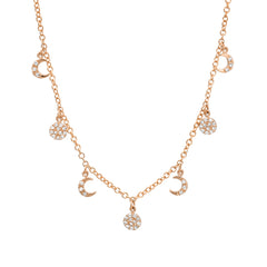 danity 14k gold chain featuring dangling discs and mini crescent moons to encapsulate the phases of the moon