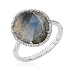 White gold ring with a large labradorite stone and micropave diamonds on a white background