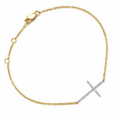 sideways cross bracelet in yellow and white gold with diamonds