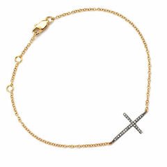 sideways cross bracelet in yellow gold and black rhodium with diamonds