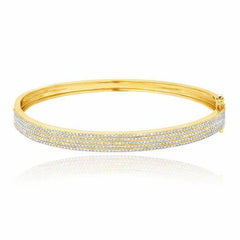 five row pave diamond bangle in yellow gold