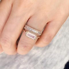 rose gold rainbow moonstone ring stacked with heirloom halfway band