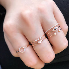 petite heart stackable band worn with other liven rings
