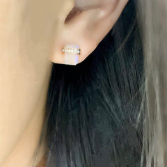 rainbow moonstone ethos post earrings - featuring a flat cut oblong colored stone with a belt of gold and diamonds