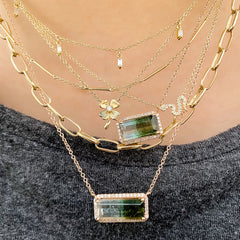 snake necklace in a "neck-mess" with other liven pieces