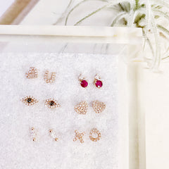 selection of whimsical romantic stud earrings