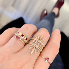 stacks of liven rings with ruby accents