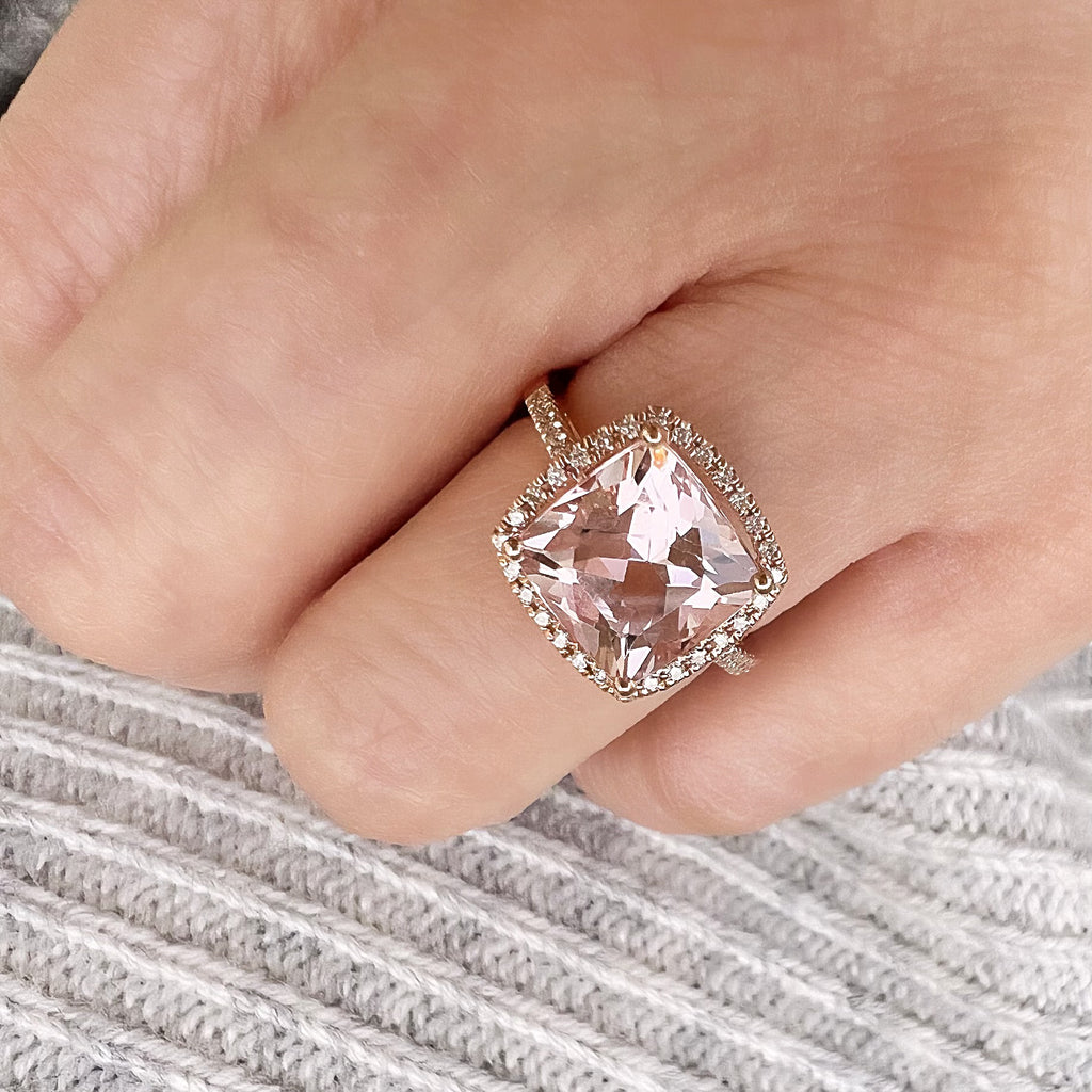 cushion cut morganite ring with a diamond halo in 14k rose gold