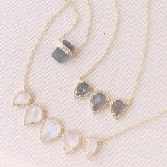 selection of labradorite and rainbow moonstone necklaces