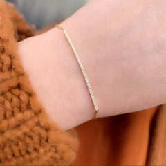 bar bracelet with a drawstring bolo connection