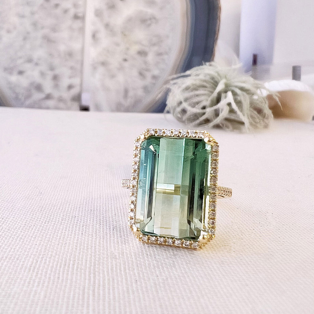 green tourmaline ring in 14k yellow gold with diamonds