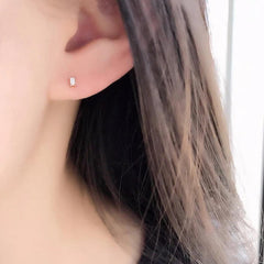 petite baguette cut diamonds in 14k gold prong settings