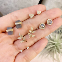 warm and lovely themed collection of liven stud earrings in 14k gold and diamonds, with labradorite