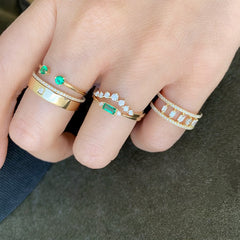 the emerald version of this petite ring