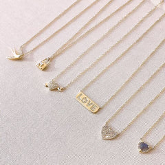 a selection of romantic necklaces