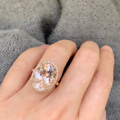large oval morganite set in 14k gold with diamonds