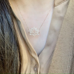 lotus flower necklace in 14k gold with diamonds